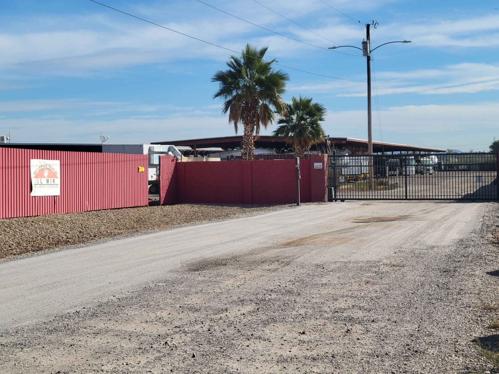 Covered storage row along the perimeter wall at the El Mirage facility